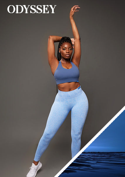 fit curvy black woman posing for a woman-owned black owned business wearing unique blue activewear set that feature seamless scrunch butt high waist leggings and strappy sports bra